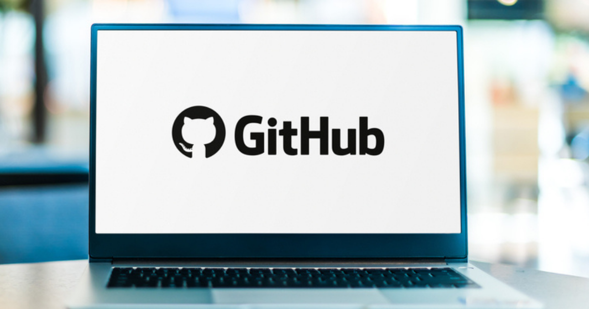 Developer´s laptop screen displaying GitHub´s logo