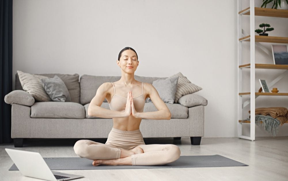 Software engineer having yoga classes paid by her company.